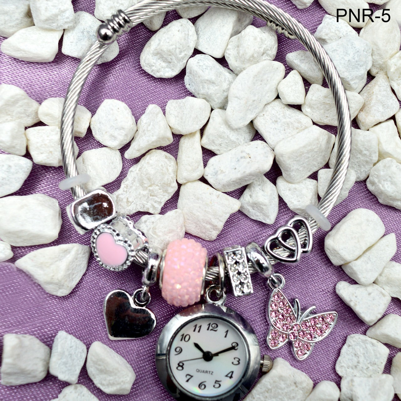 HERMOSO RELOJ PARA DAMA TIPO PULSERA CON DIJES INCLUIDOS