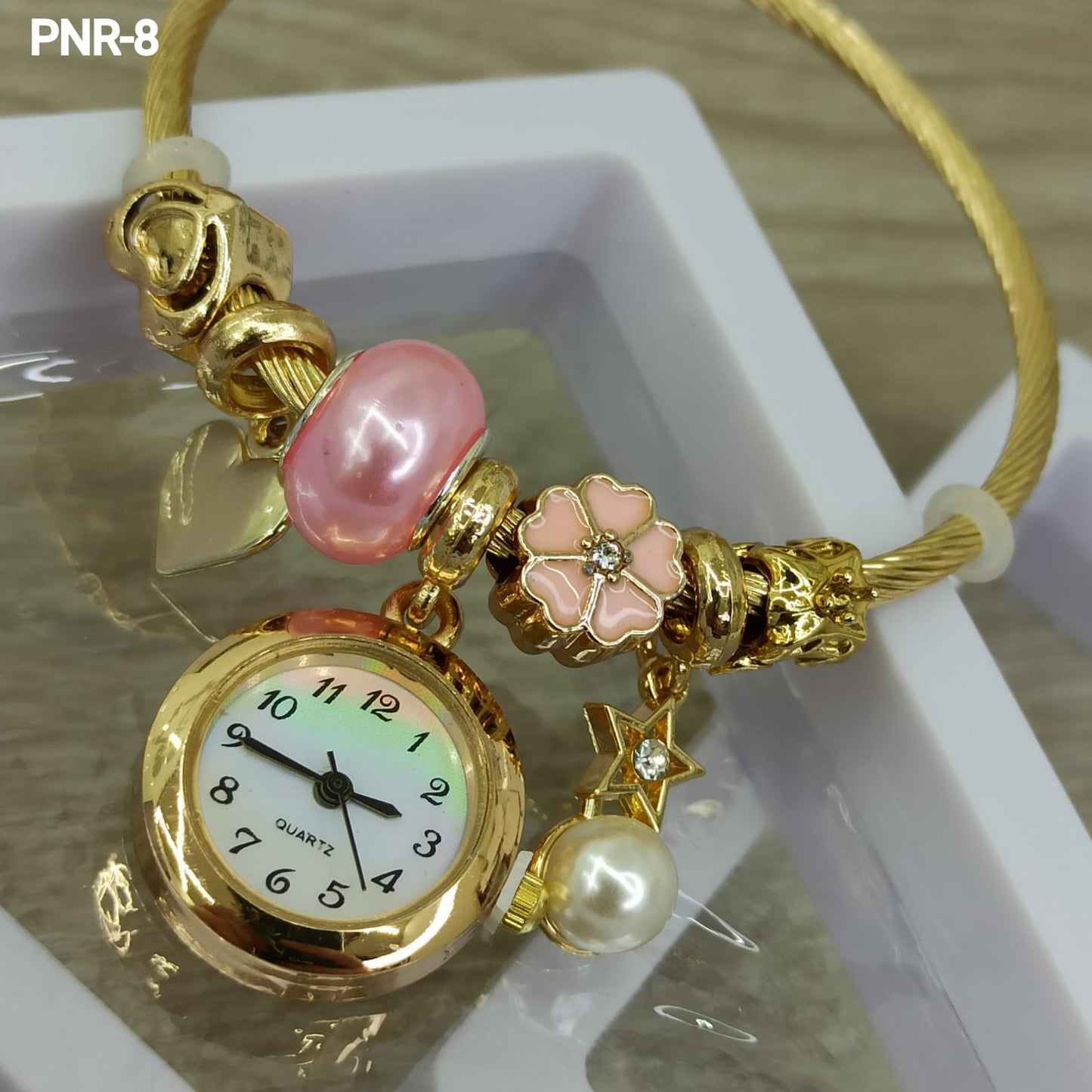 HERMOSO RELOJ PARA DAMA TIPO PULSERA CON DIJES INCLUIDOS